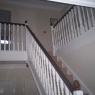 Lee Painting & Decorating - The staircase was spray painted to give a smooth water based gloss white finish.