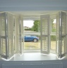 Ultimate Blinds & Shutters - Ultimate Shutters - Bi-folding Bay Doors