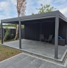 Stamford Garden Studios & Landscaping Ltd - Aluminium Pergola with Porcelain raised patio