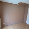NW Plastering Co. - Water Damaged Wall After